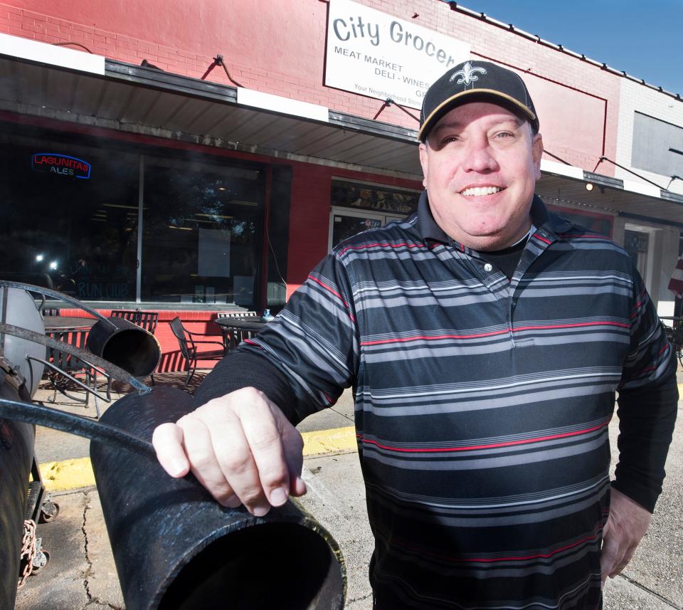 John Kirby, general manager of City Grocery, stands on Thursday, Jan. 18, 2018, outside his business on 12th Avenue in Pensacola.