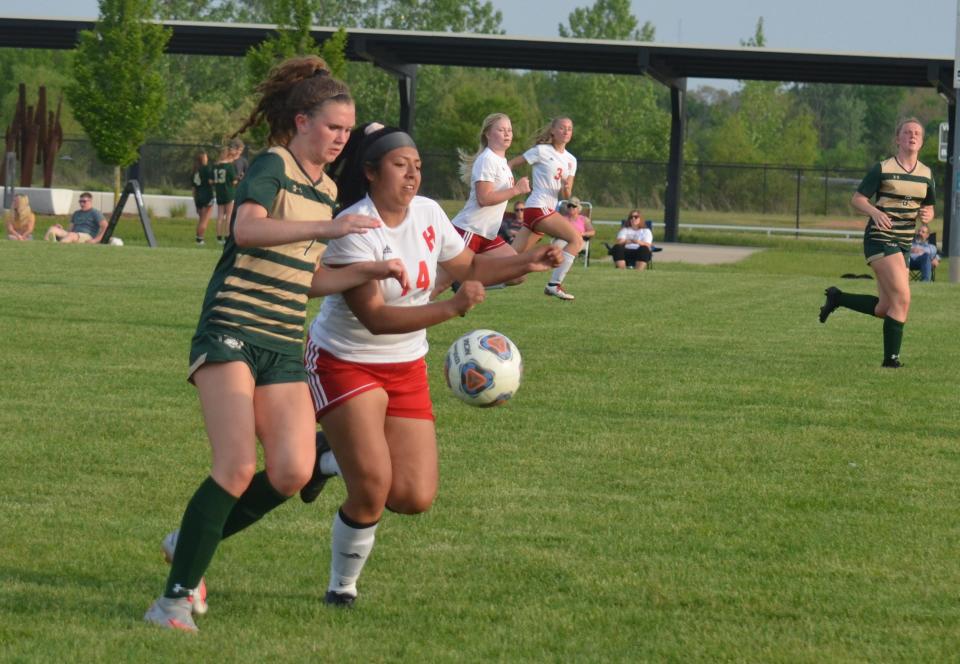 Zeeland West's Abby Winn (left) is one of the top soccer players in the state.