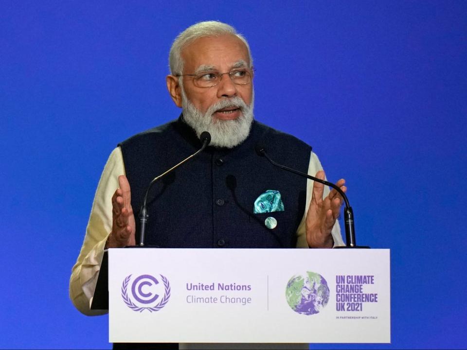 India will hit net-zero emissions by 2070, PM Narendra Modi told the Cop26 climate summit in Glasgow (AP)