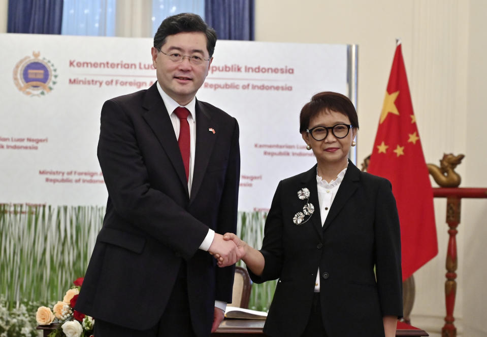 Indonesian Foreign Minister Retno Marsudi, right, shakes hands with her Chinese counterpart Qin Gang during their meeting at the 4th Joint Commission for Bilateral Cooperation, in Jakarta, Indonesia, Wednesday, Feb. 22, 2023. (Adek Berry/Pool Photo via AP)