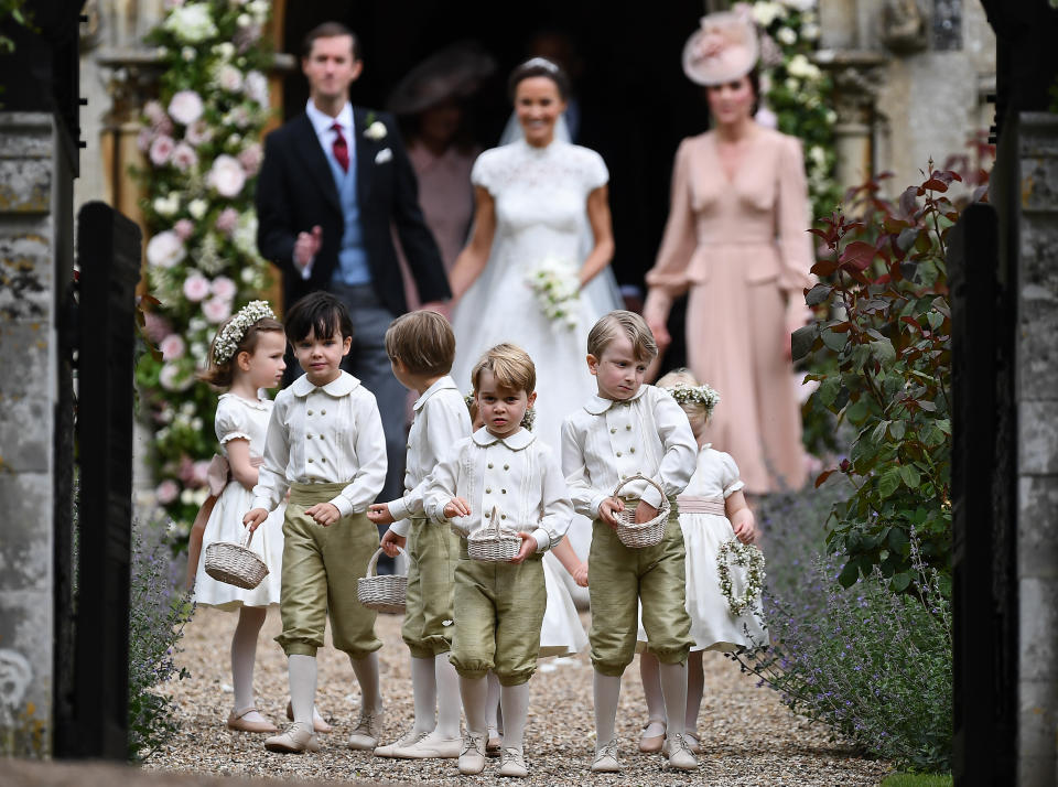 ENGLEFIELD GREEN, ENGLAND - MAY 20: Pageboy Prince George of Cambridge leads the bridesmaids and pageboys out of church after his aunt Pippa Middleton marries James Matthews following their wedding ceremony at St Mark's Church on May 20, 2017 in Englefield Green, England.  (Photo by Justin Tallis - WPA Pool/Getty Images)