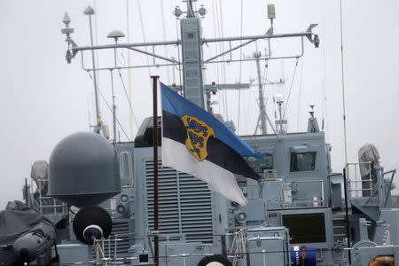 Estonian navy flag flutters on the mine hunting ship in the navy port in Tallinn, Estonia February 17, 2017. REUTERS/Ints Kalnins