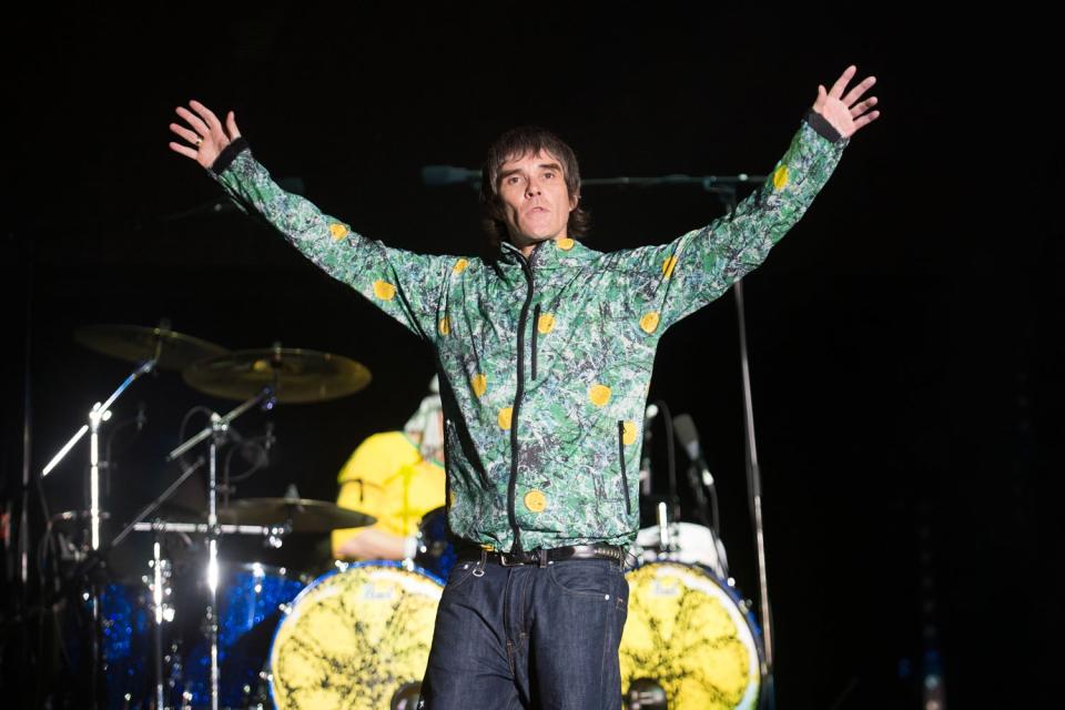 <p>Ian Brown of The Stone Roses during his headline show at the Virgin Media stage</p> (Samir Hussein/Getty)