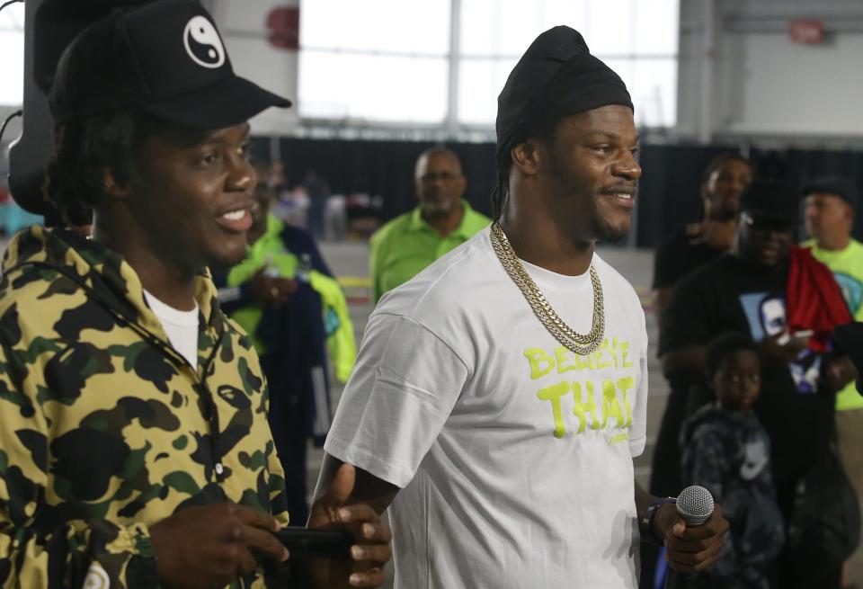 Former U of L quarterbacks Lamar Jackson and Teddy Bridgewater hosted the Derby City Reunion Weekend. Local organizations sat up booths to share health tips and schedule screening while kids played games and interact with the players.April 30, 2022