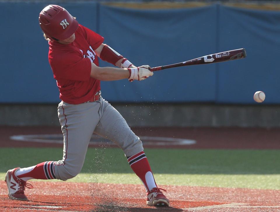 Jim Ned High School's Troy Doran hits a pitch during the District 6-3A championship against Wall at Angelo State University's Foster Field at 1st Community Credit Union Stadium on Monday, May 2, 2022.