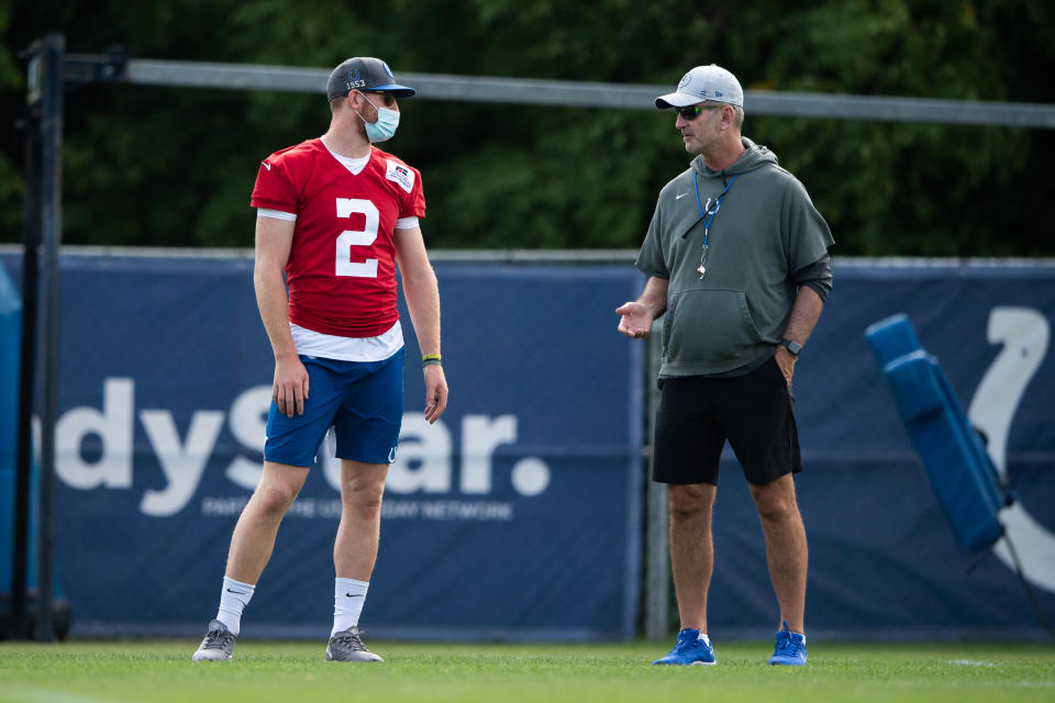 WESTFIELD, IN - AUGUST 07: Indianapolis Colts quarterback Carson Wentz (2) talks to Indianapolis Colts head coach Frank Reich during the Indianapolis Colts training camp practice on August 7, 2021 at Grand Park Sports Complex in Westfield, IN. (Photo by Zach Bolinger/Icon Sportswire via Getty Images)