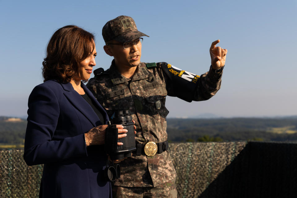 U.S. Vice President Kamala Harris looks toward the North Korean north side of the border   from an observation post, with a South Korean soldier, as she visits the Demilitarized Zone in Paju, South Korea, September 29, 2022. / Credit: SeongJoon Cho/Bloomberg/Getty