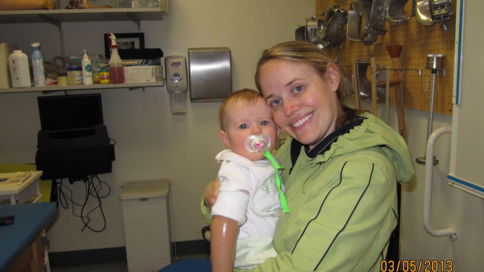 Aubrey Sauvie is pictured as a baby wearing her first prosthetic arm. - Jennifer Sauvie