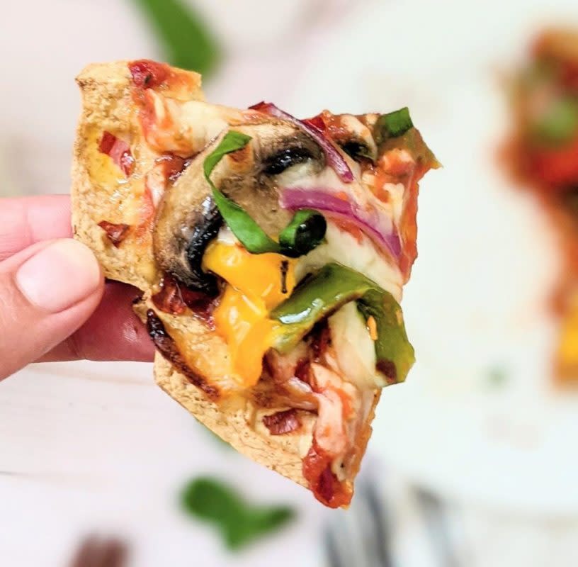 <p>The Herbeevore</p><p>A crispy, high-protein dream snack starts with cooking tofu in the waffle maker- genius!</p><p><strong>Get the recipe: <a href="https://parade.com/1255444/kavitharamaswamy/tiktok-tofu-pizza-waffles/" rel="nofollow noopener" target="_blank" data-ylk="slk:TikTok Tofu Pizza Waffles;elm:context_link;itc:0;sec:content-canvas" class="link rapid-noclick-resp">TikTok Tofu Pizza Waffles</a></strong></p>