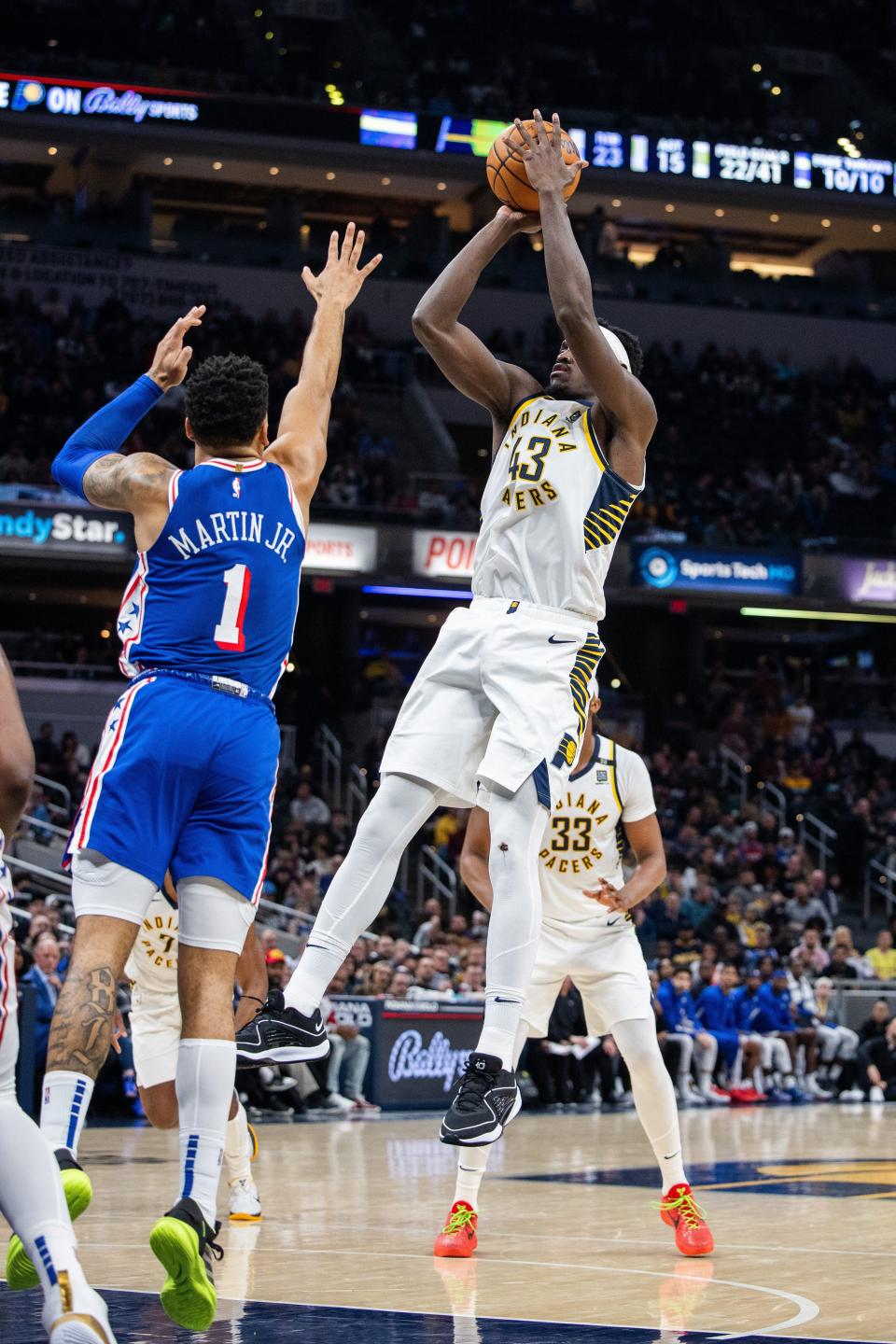 Jan 25, 2024; Indianapolis, Indiana, USA; Indiana Pacers forward Pascal Siakam (43) shoots the ball while Philadelphia 76ers forward KJ Martin (1) defends in the first half at Gainbridge Fieldhouse.