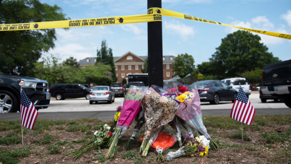 People from the community pay their respects to the victims of a deadly shooting at a Virginia Beach public works building, which claimed the lives of 12 people in Virginia Beach, Virginia on June 01, 2019. | Marvin Joseph—The Washington Post/Getty Images