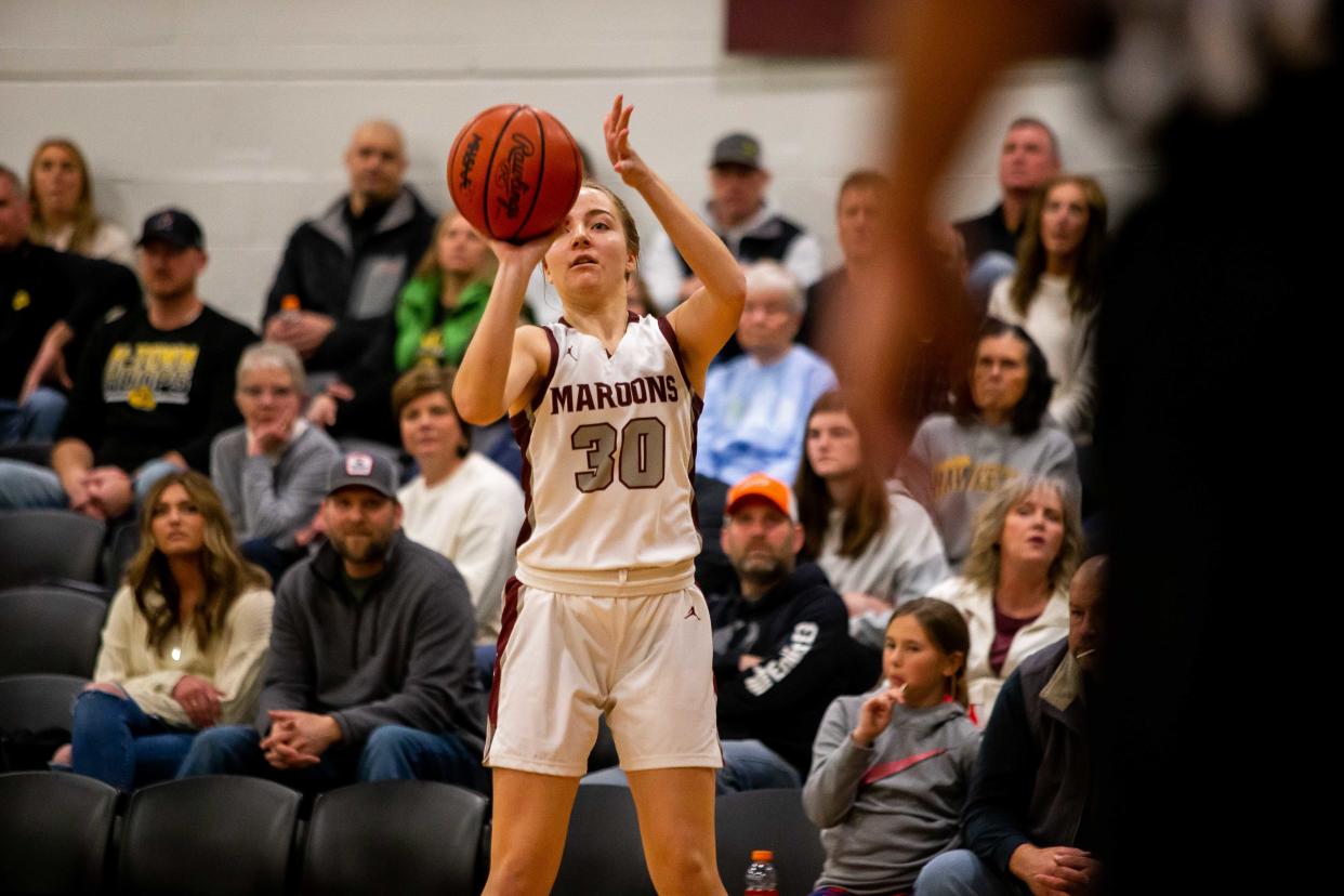 Holland Christian's Bria Lampen takes a three-pointer against Hamilton Thursday, Feb. 24, 2022, at the Holland Civic Center. 