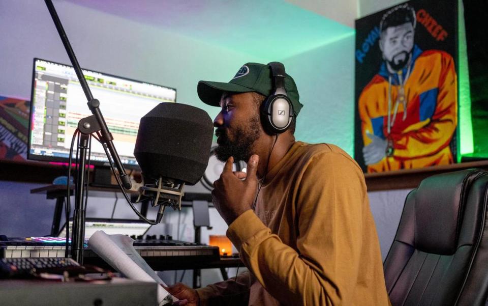 Jamel Thompson, also known by his stage name Royal Chief, raps lyrics to a new a song in his home studio. His song “See Me Now” is featured in episode one of the second season of “Bel-Air.”