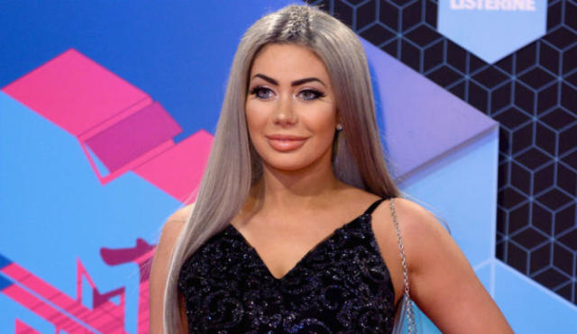 Chloe Ferry battles to stop her boobs popping out as she is caught