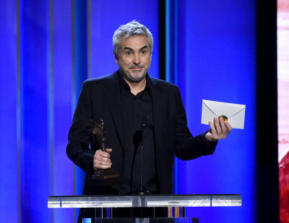 Alfonso Cuaron accepts the award for best international film for "Roma" at the 34th Film Independent Spirit Awards on Saturday, Feb. 23, 2019, in Santa Monica, Calif. (Photo by Chris Pizzello/Invision/AP)