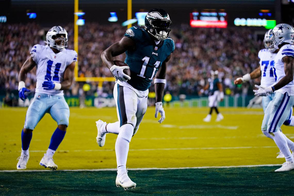 Philadelphia Eagles’ A.J. Brown scores a touchdown during the first half of an NFL football game against the Dallas Cowboys on Sunday, Oct. 16, 2022, in Philadelphia.