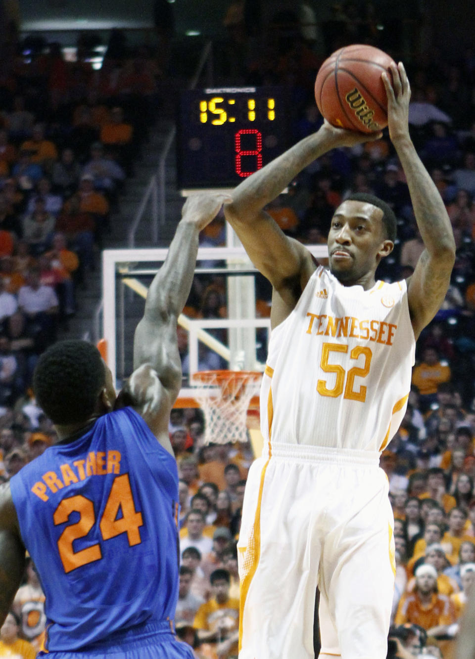 Tennessee guard Jordan McRae (52) shoots over Florida forward Casey Prather (24) in the first half of an NCAA college basketball game on Tuesday, Feb. 11, 2014, in Knoxville, Tenn. (AP Photo/Wade Payne)