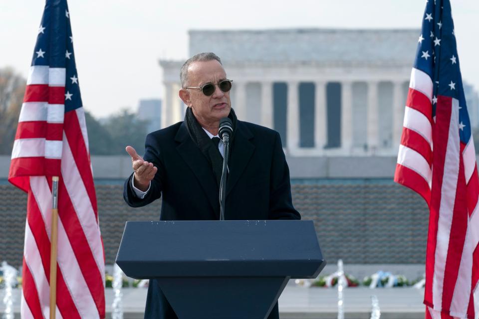 With the Lincoln Memorial in the background, actor and filmmaker Tom Hanks speaks during a ceremony in honor of former Sen. Bob Dole, R-Kan., at the National World War II Memorial, on Friday.