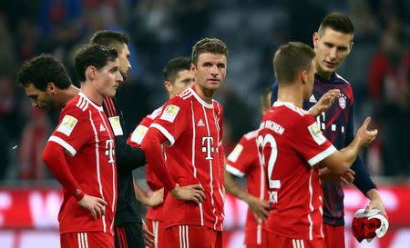 Soccer Football - Bundesliga - FC Bayern Munich vs VfL Wolfsburg - Allianz Arena, Munich, Germany - September 22, 2017 Bayern Munich's Thomas Muller (C) and team mates look dejected after the match REUTERS/Michael Dalder