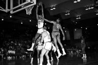 FILE - In this Oct. 31, 1962, file photo, Wilt Chamberlain (13) leading scorer in the NBA, shoots as Willie Naulls (6) tries to block during a game at San Francisco with the New York knickerbockers. (AP Photo/File)