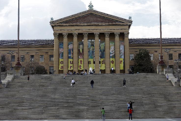 In this Wednesday, May 8, 2013 photo visitors climb the steps of the Philadelphia Museum of Art in Philadelphia. The City of Brotherly Love is perhaps best known for its Colonial roots but locals will tell you there's much more to explore in this city of 1.5 million people. (AP Photo/Matt Rourke, File)