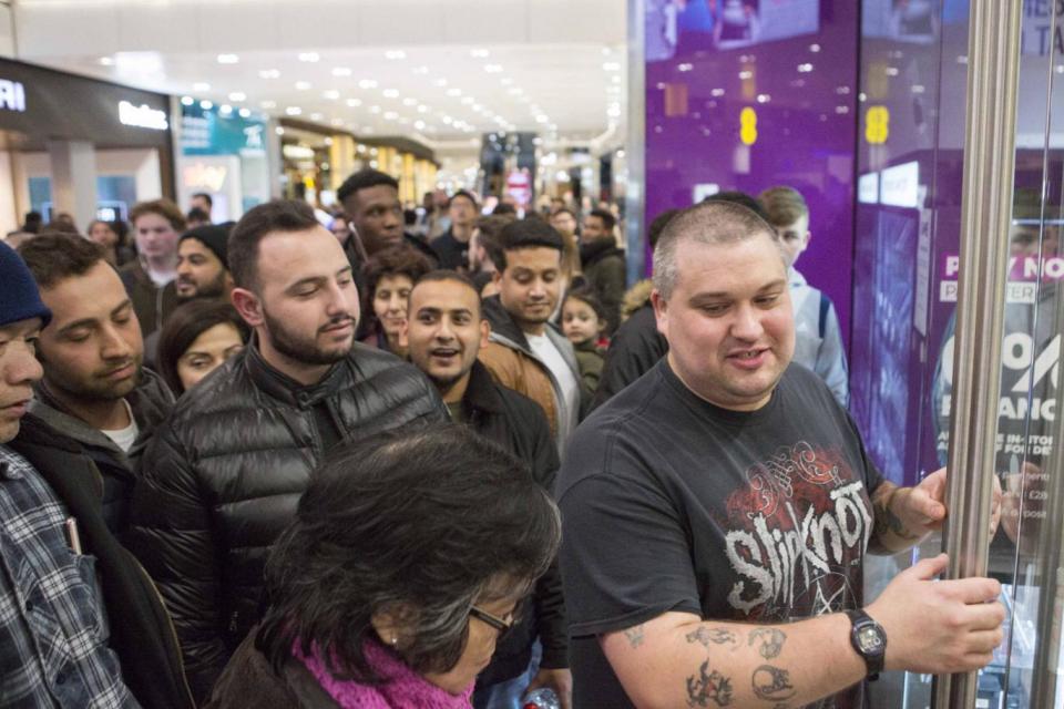 Shoppers at the Westfield centre in Stratford (PA)