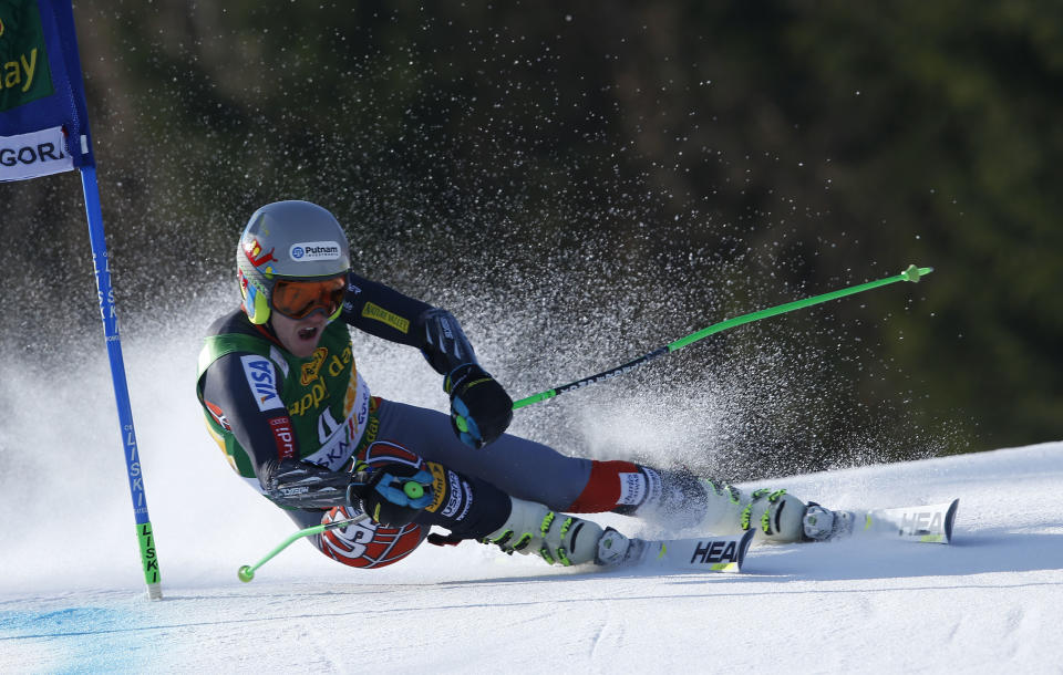 Ted Ligety of United States competes during the first run of an alpine ski men's World Cup giant slalom, in Kranjska Gora, Slovenia, Saturday, March 8, 2014. (AP Photo/Shinichiro Tanaka)