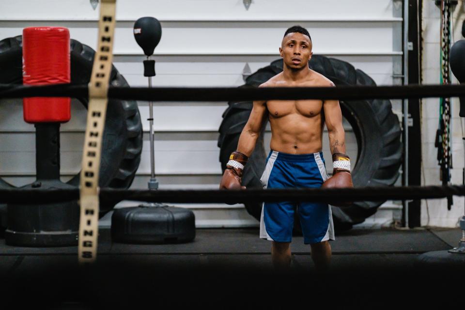 Professional boxer Andre Donovan, from Dennison, takes a breather from training sessions at T-County Boxing Academy, Thursday night, March 16 in New Philadelphia.