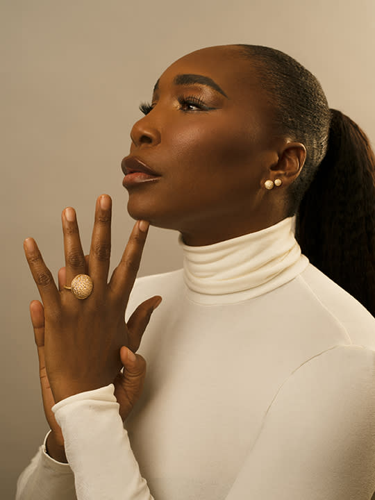 Venus Williams wearing the Pave Dome Large Ring in 20-karat Peach Gold ($22,000), the Pave Dome Large Studs in 20-karat Peach Gold ($5,500) and the Pave Dome Small Studs in 20-karat Peach Gold ($3,500) from her Reinstein Ross Diamond Match collection. 