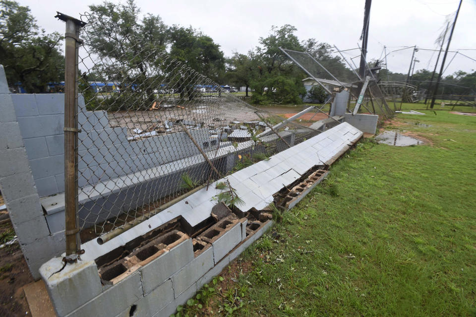 <p>The dugout of a baseball field is destroyed in Fort Walton Beach, Fla. on June 20, 2017, as severe weather from Tropical Storm Cindy brushed along the northwest coast of Florida. (Photo:Devon Ravine/Northwest Florida Daily News via AP) </p>