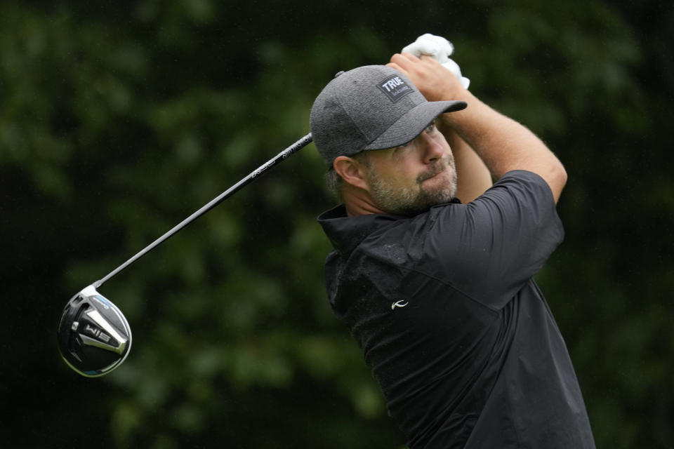 Ryan Moore hits off the second tee during the final round of the John Deere Classic golf tournament, Sunday, July 11, 2021, at TPC Deere Run in Silvis, Ill. (AP Photo/Charlie Neibergall)