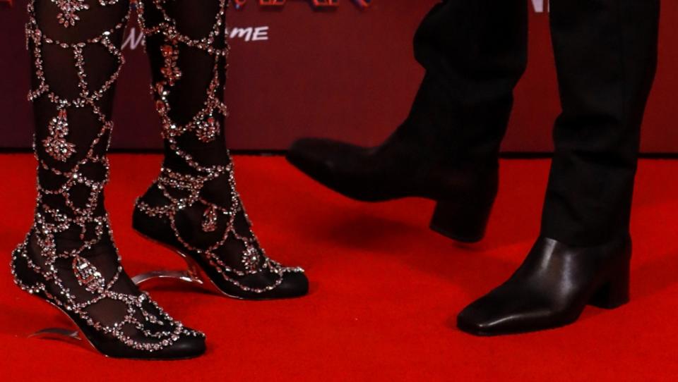 A closer look at Zendaya and Tom Holland’s footwear at the premiere of ‘Spider-Man: No Way Home.’ - Credit: Splash