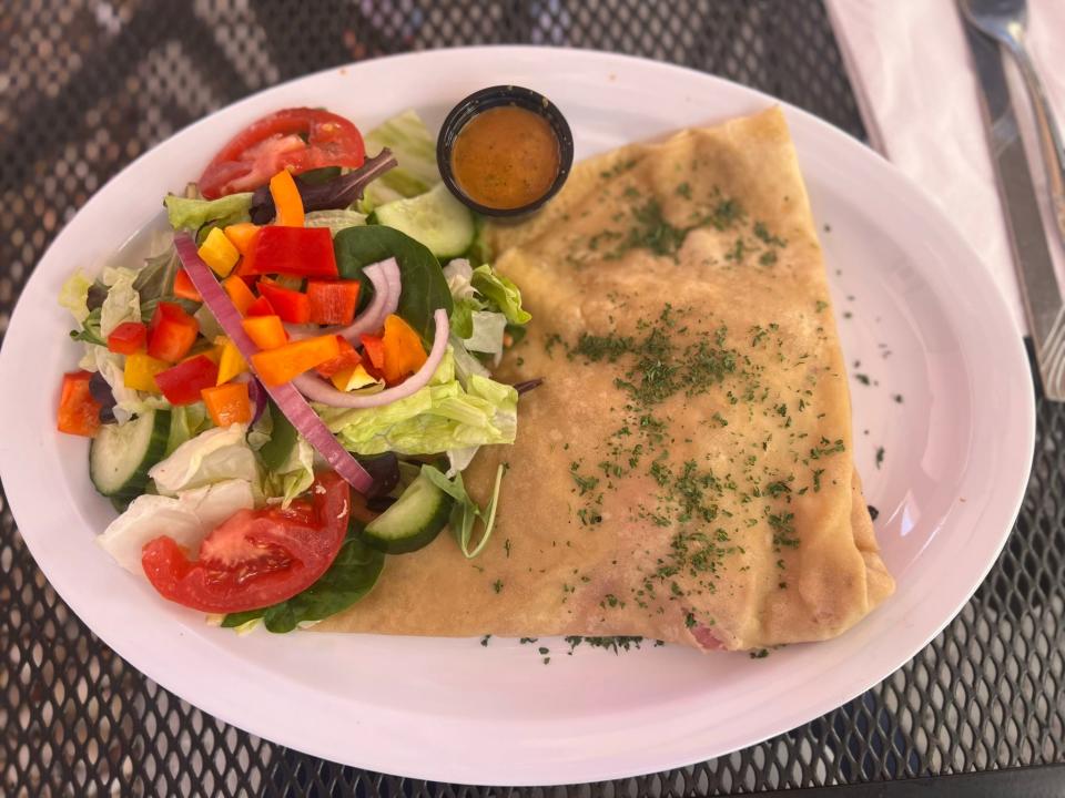 Savory crepes at Mon Paris are served with a salad.