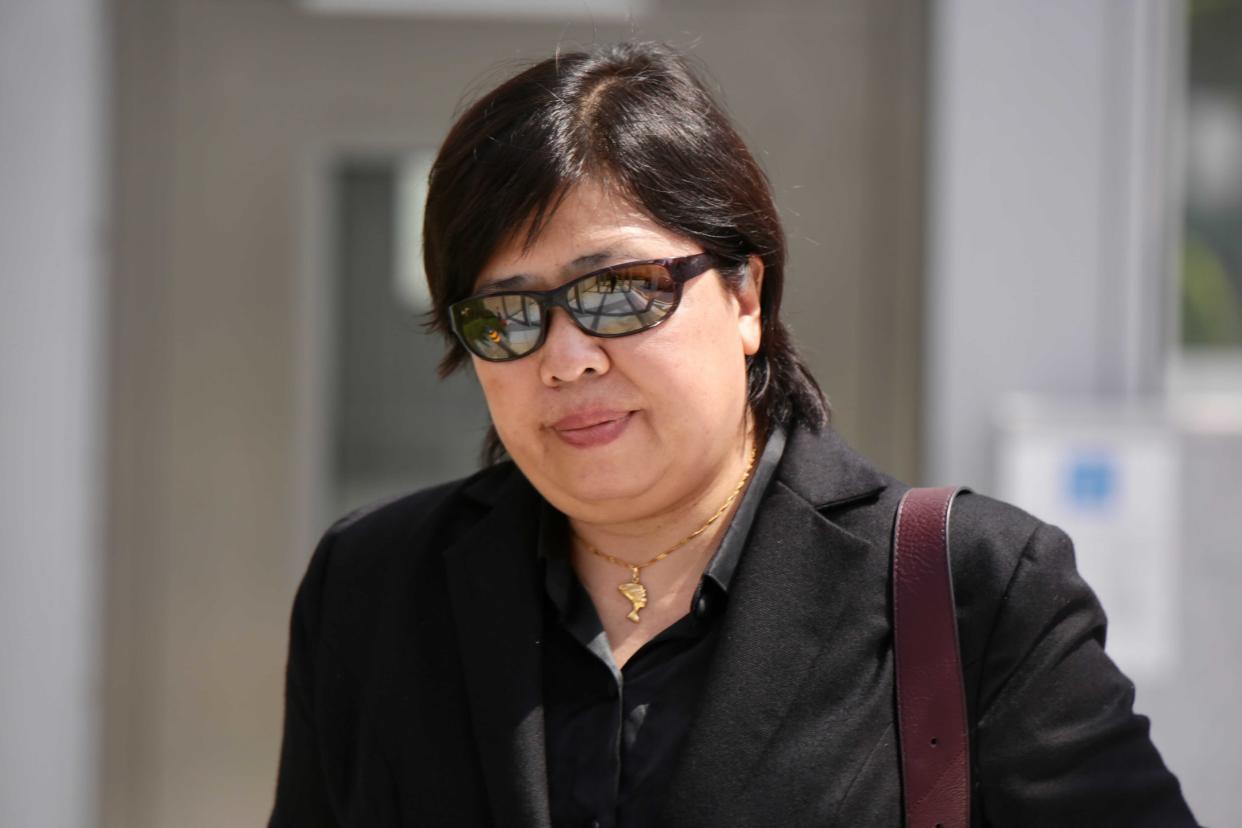 Phoon Chiu Yoke, 53, seen leaving the State Courts on Monday (24 May). She is currently on trial for breaching COVID-19 regulations by not wearing a mask while at Newton Food Centre in May last year. (PHOTO: Yahoo News Singapore/Dhany Osman)