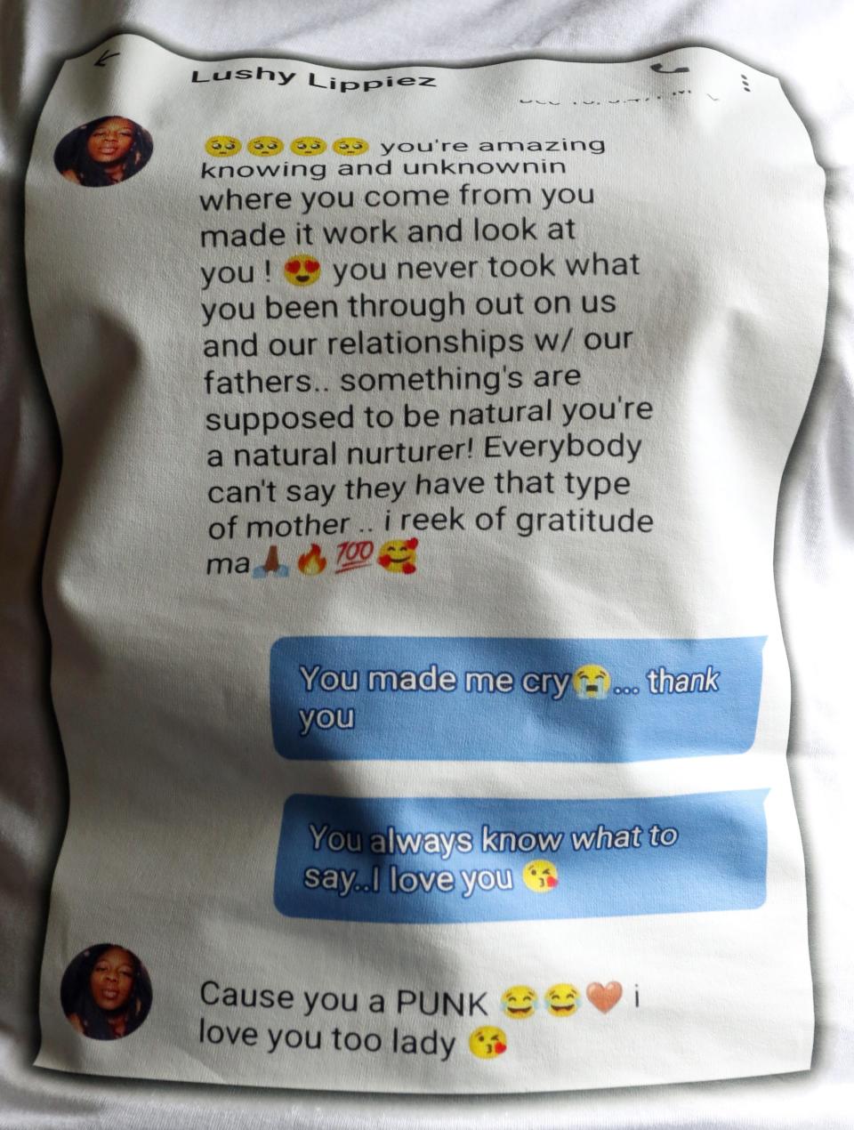 Wanda Brown Steele wears a shirt with the last text messages she received from her daughter, Anndel Taylor, who died from carbon monoxide poisoning while she was trapped in the car on the side of the road during a blizzard near Buffalo, New York.