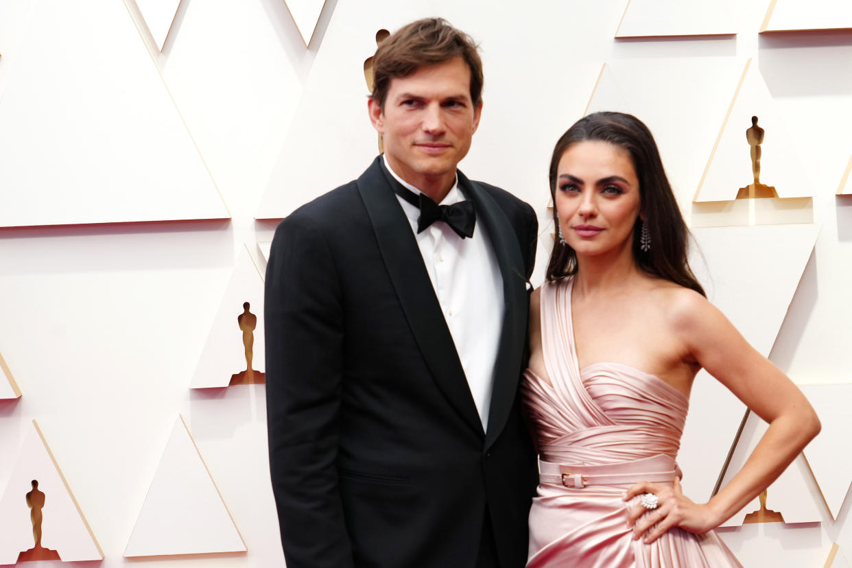 Ashton Kutcher and Mila Kunis attend the 94th Annual Academy Awards on March 27, 2022. 