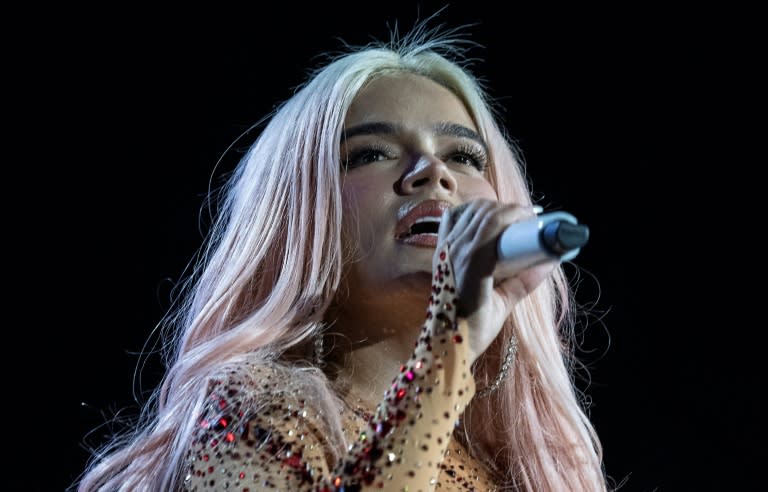 La cantante colombiana Karol G canta durante una actuación en el estadio Nacional de San José de Costa Rica, el 9 de marzo de 2024 (Ezequiel Becerra)