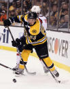 BOSTON, MA - APRIL 14: Brad Marchand #63 of the Boston Bruins tries to keep the puck from Nicklas Backstrom #19 of the Washington Capitals in Game Two of the Eastern Conference Quarterfinals during the 2012 NHL Stanley Cup Playoffs at TD Garden on April 14, 2012 in Boston, Massachusetts. (Photo by Elsa/Getty Images)