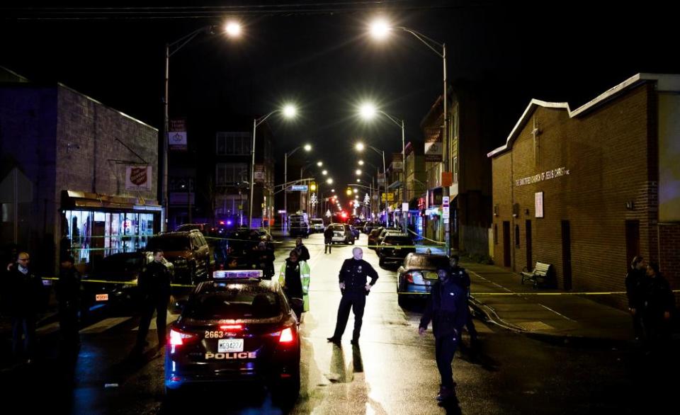 Police at the scene of the Jersey City shooting. Residents hid in a nearby Synagogue to escape the attack.