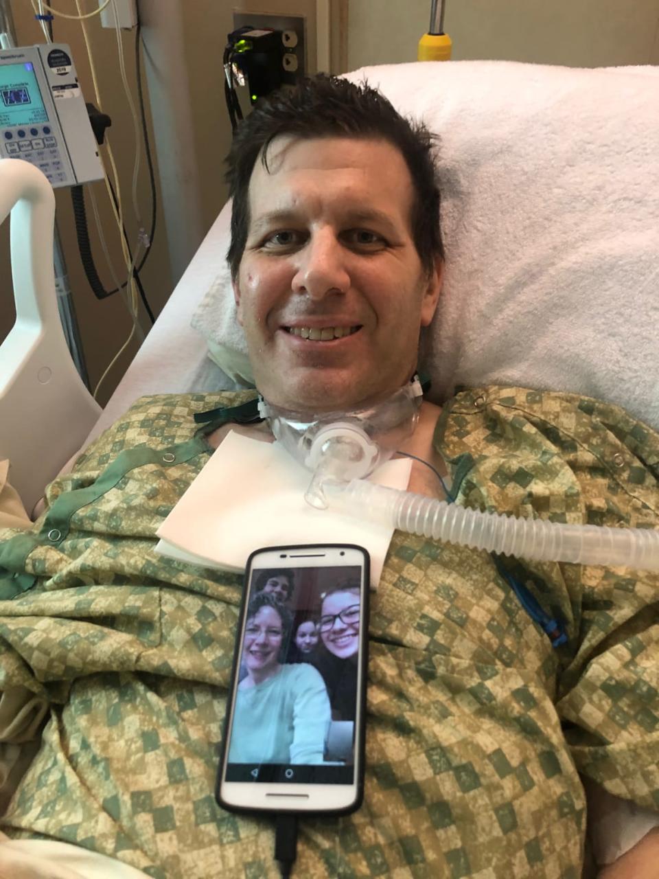 <div class="inline-image__caption"><p>Edward in the hospital, one day released from the ICU, enjoying his first FaceTime interaction with his family (seen on phone) since he woke up.</p></div> <div class="inline-image__credit">Courtesy Yasmeen Al-Shehab, Holy Name nurse</div>