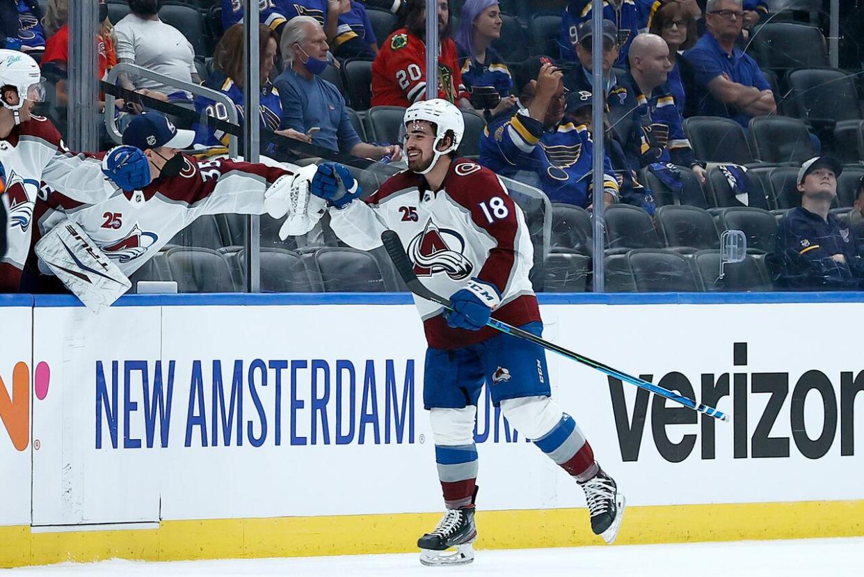 Alex Newhook #18 of the Colorado Avalanche celebrates after scoring a goal against the St. Louis Blues on Friday. (Tom Pennington/Getty Images - image credit)