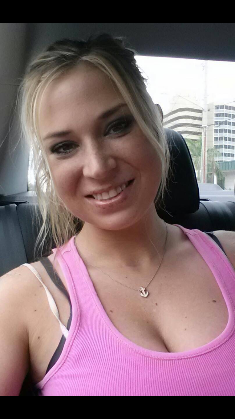 Brittany Rose Hallett, 26, is shown in Fort Myers, Fla. during her last vacation before she drank herself to death in 2014.