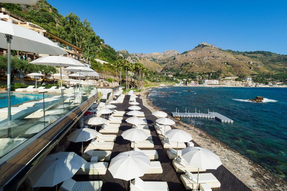Overlooking the Baia delle Sirene from the terraces of Atlantis Bay Hotel.