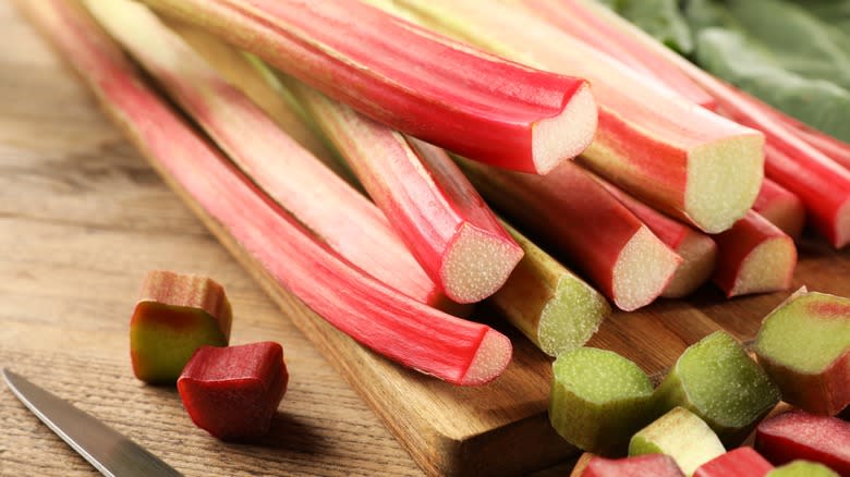 Rhubarb stalks on wooden table