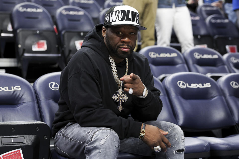50 Cent poses for a photo prior to an NBA basketball game between the Washington Wizards and the Minnesota Timberwolves, Tuesday, April 9, 2024, in Minneapolis. (AP Photo/Matt Krohn)
