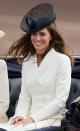 <p>Unlike Camilla, who kept her whole look light, the Duchess accessorised with a black hat to create this chic monochrome situation.</p>