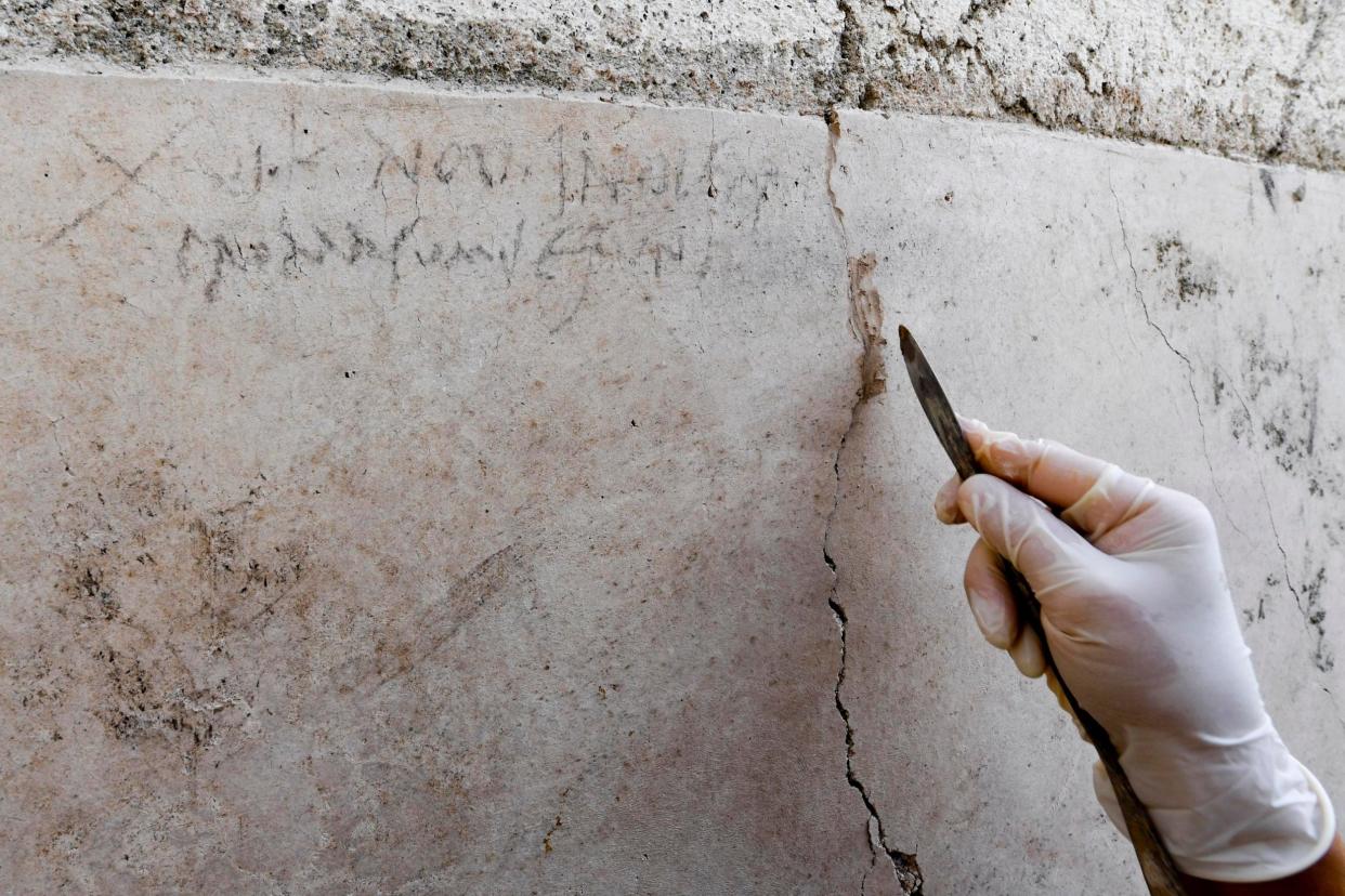 Inscription: the writings suggest the catastrophic eruption happened two months later than thought: AP