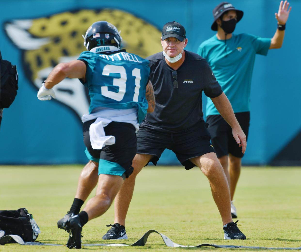 Jaguars offensive coordinator Jay Gruden keeps an eye on RB #31, Nathan Cottrell during drills at Wednesday's practice session. The Jacksonville Jaguars practice session at the practice fields outside TIAA Bank Field in Jacksonville, Florida Wednesday August 12, 2020. [Bob Self/Florida Times-Union]