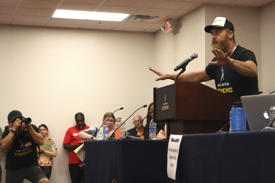 Actor Ethan Embry speaks during a SAG-AFTRA rally in Atlanta on July 17, 2023. Embry has been a vocal supporter of the strike, which has had an especially large effect on Atlanta, one of the nation's filming hubs. (AP Photo/R.J. Rico)