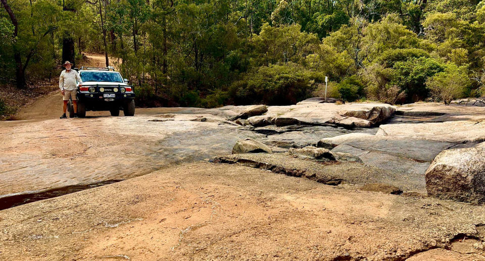 Man standing at Moon's Crossing in WA. 